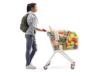 Female student with food in a shopping cart