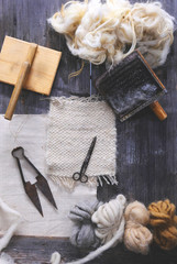 Wooden weaving shuttle on an old manual weaving machine
