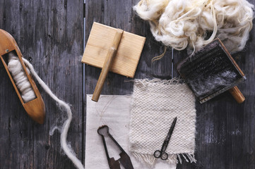 Wooden weaving shuttle on an old manual weaving machine