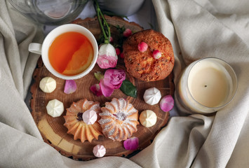 tea  cookies and a cupcake