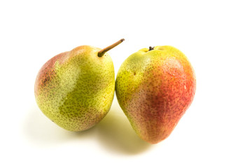 Ripe fresh pear on a white isolated background. Dietary food. Vegetarianism.