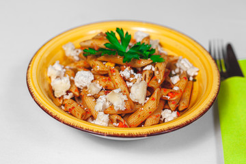 Pasta salad with cheese and tomatoes