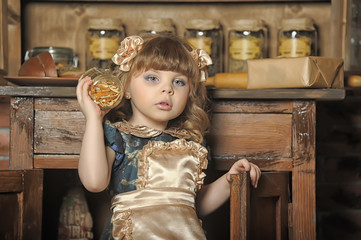 little girl in a vintage kitchen
