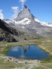 The famous swiss peak of matterhorn is mirrored in lake ryffel