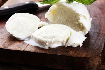 Mozzarella. Traditional italian food. White ball mozzarella buffalo Italian soft cheese with fresh basil