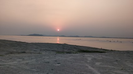 Fototapeta premium sunset on the beach of Brahmaputra