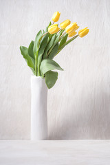 vase and flowers minimalist arranged  tulips