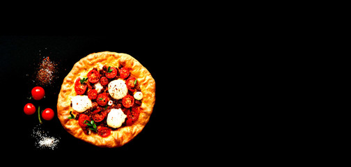 Classic homemade pizza on dark background. Italian food. Happiness is in small thngs.
