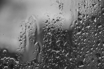 drops of water on a transparent glass. Glass after rain.