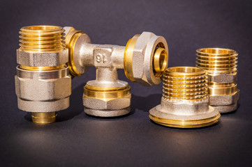 The set of brass fittings is often used for water and gas installations