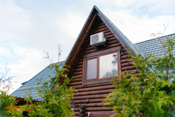 House in the woods log cabin with air conditioning.
