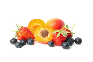 Tasty strawberry, apricot and blueberry isolated on white background