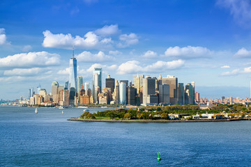 New York City panorama from the bay with Governors island and Manhattan Skyline 