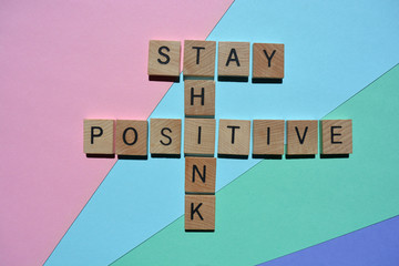 Stay, Think, Positive, crossword on colourful background