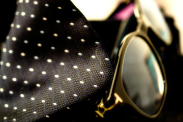 glasses and tie
