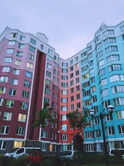 Modern residential building. Colorful residential buildings. Street