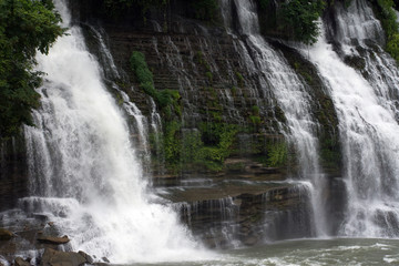 Large waterfalls cascading over rock ledges.