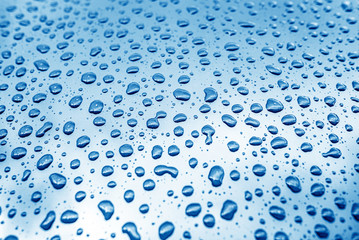 Abstract water drops on a blue background