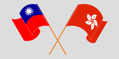 Crossed and waving flags of Hong Kong and Taiwan