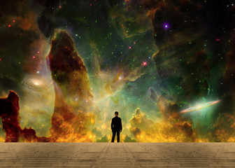 Fototapeta premium A man in a black suit sees a bright universe
