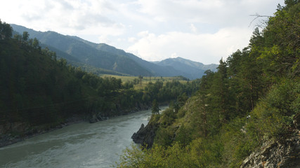 Fototapeta na wymiar Altai landscape. River, mountains, forest. Summer trip to Siberia.