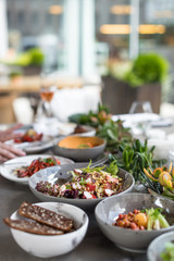 Summer Lunch with Mediterranean Salads and Appetizers. Dinner Table