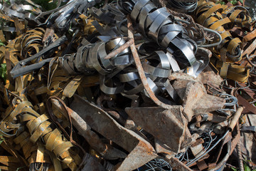  Pile of scrap metal closeup. Landfill of rusty scrap metal, case, wire. Metal texture