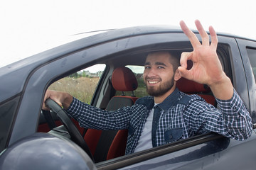 Gestures in a beautiful man's car