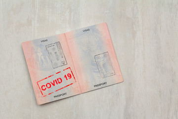 passport with a COVID 19 stamp on it