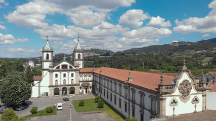 Aerial view of the Monastery of St. Benedict (Sao Bento) in the city of Santo Tirso, Portugal, with the Ave River in the background. Benedictine order.