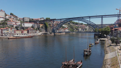 The iconic Rabelo Boats, the traditional Port Wine transports, with the Ribeira District and the...