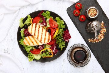 Salad with vegetables and grilled cheese. Copy of the space.Top view.