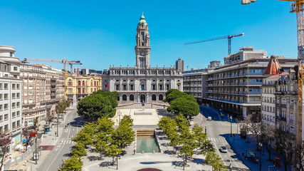 The Porto City Hall is perched atop the Avenida dos Aliados, or the Avenue of the Allies, on a line of Art Deco and Art Nouveau facades in Porto, Portugal.