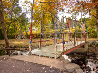 decorated bridge with tree branches and arts and crafts to celebrate indigenous people and their...
