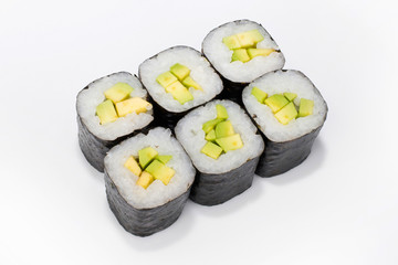 Japanese roll of nori, rice and avocado legs on a white background