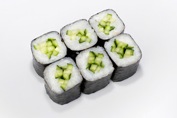 Japanese kappa maki roll of rice, nori and cucumber on a white background