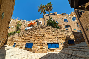 Ancient stone houses and narrow street of old Jaffa, Israel.
