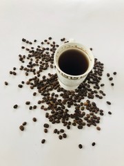 cup of coffee with beans