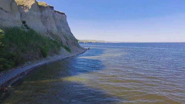 Flying up along the cliff