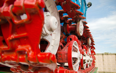 Blue old russian vintage tractor. Closeup image