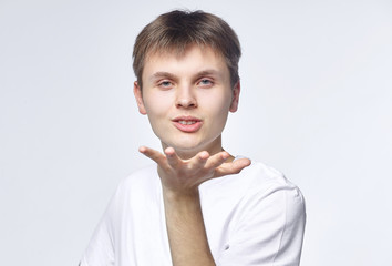 The young guy shows various emotions. Talented portrays the inner state and mood. Advertisement concept