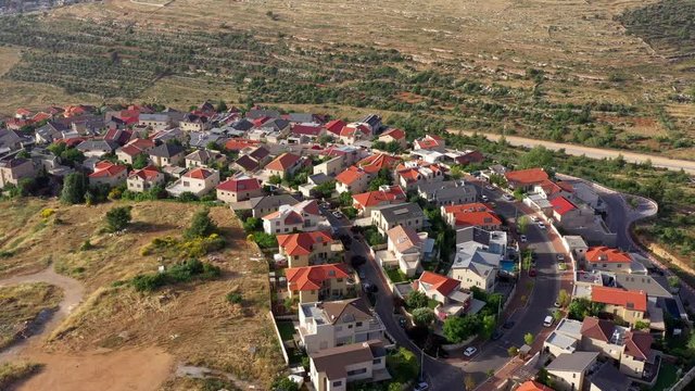 Small town with red rooftops Close to Jerusalem Aerial
Har Adar Israeli settlement, Israel, May/2020
