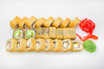 Sharp Japanese roll set according to the traditional Japanese recipe Ebi-Wan, Tai Tempura, ballista on a white background