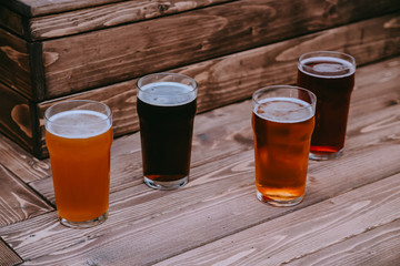 glass of beer on wooden table