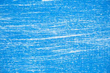 Horizontal natural wood background painted with blue paint. Interior and design concepts for creativity