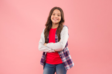 Stylish and fancy. Living happy life. Nice time to be teen. Kid fashion. Smiling school girl. Kid with long hair. Happy child. Happy childrens day. Childhood concept. Little girl pink background