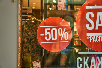 Signboard sale. Russian language sale. Discounts up to 70 percent.