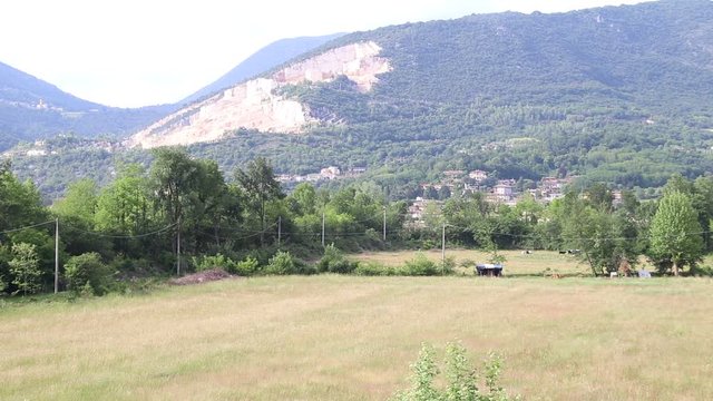 landscape with meadow and mountains in northern Italy