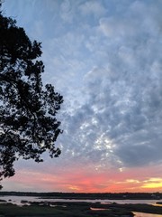 Fototapeta na wymiar marsh sunset views with clouds