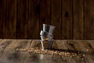 stacked metal bowls on wood